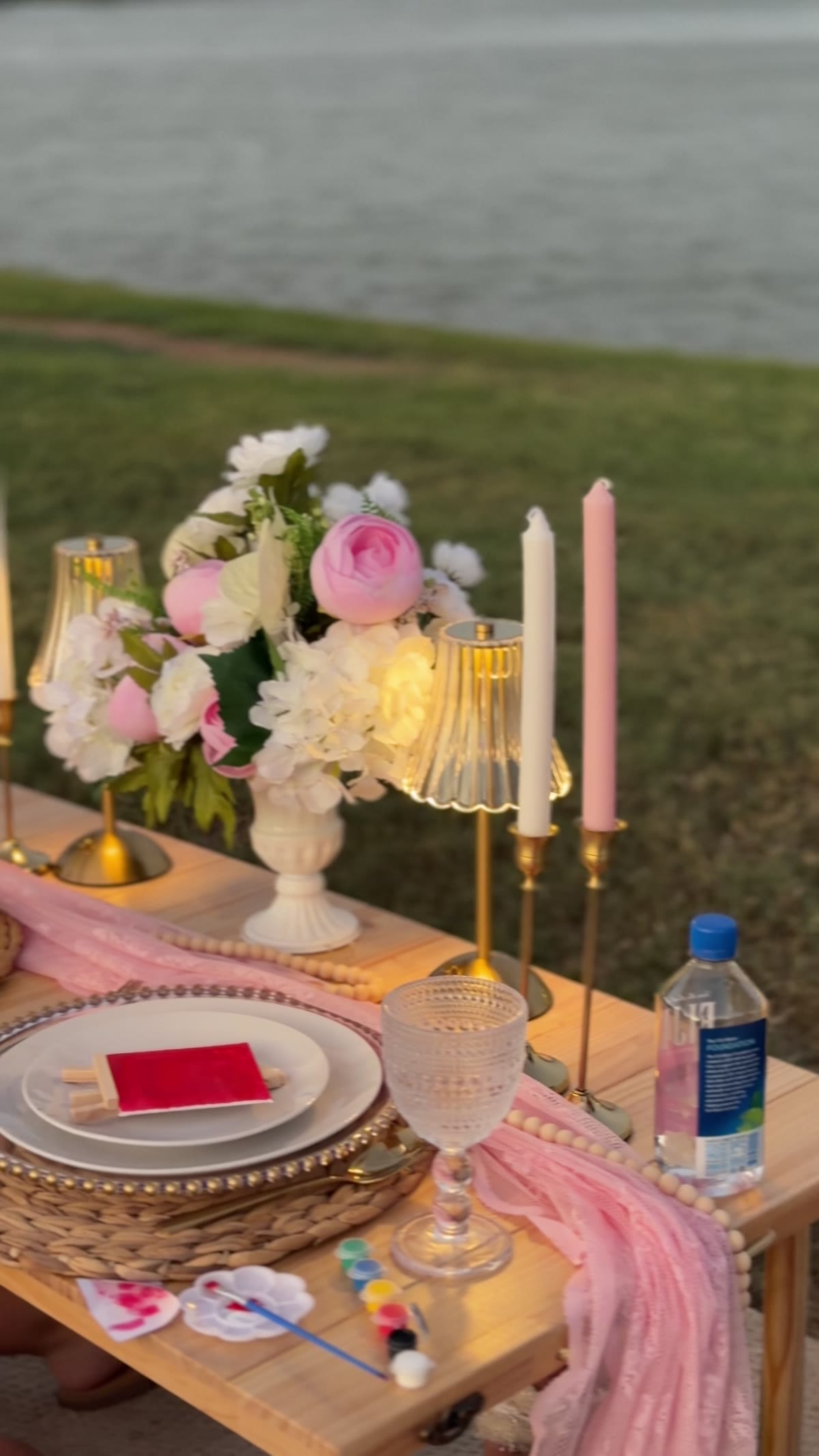 Lakeside luxury picnic setup