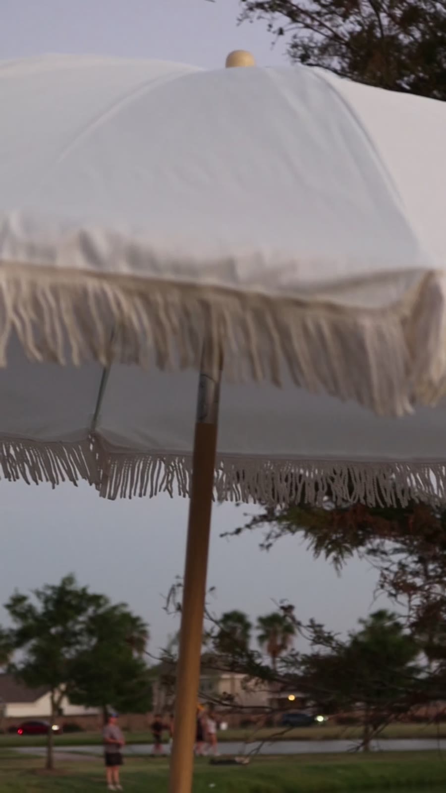 Fringe umbrella at dusk